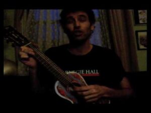 Thumbnail image of video titled "Pizza Parlour Song -- Switching from Right-Handed to Left-Handed Guitar Midsong" by Daniel Mackler